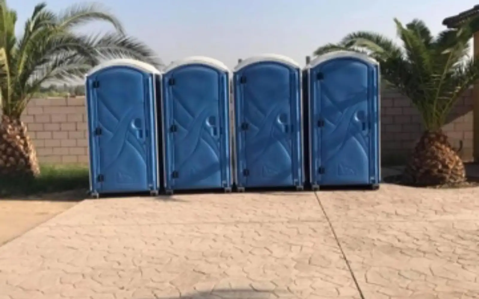 Porta potties set up by David Rental Works