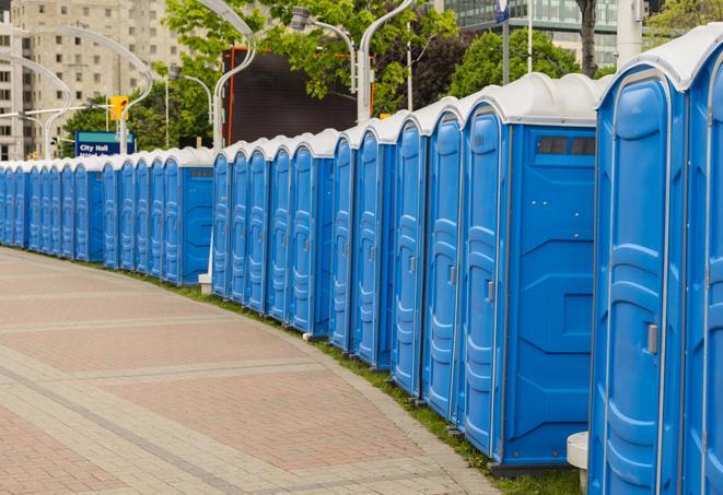 a row of portable restrooms at a fairground, offering visitors a clean and hassle-free experience in pico
